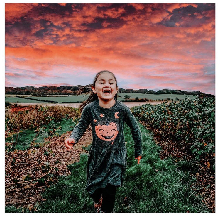 child running in field