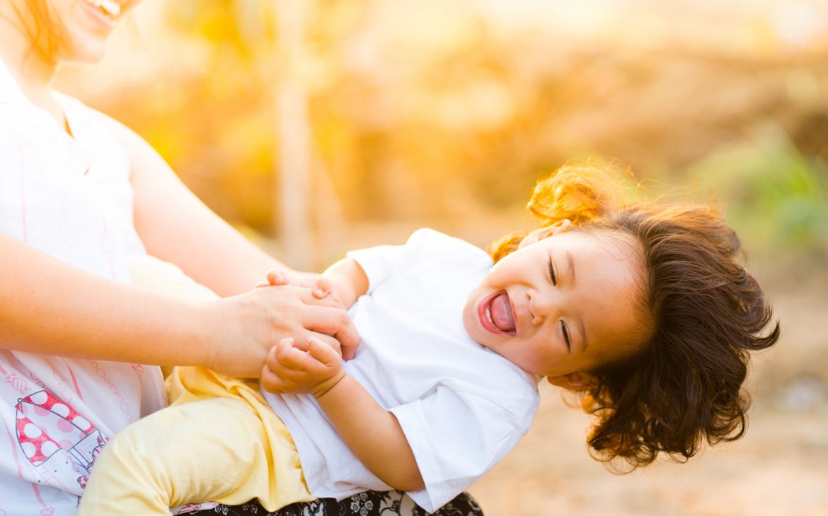 woman carrying a child