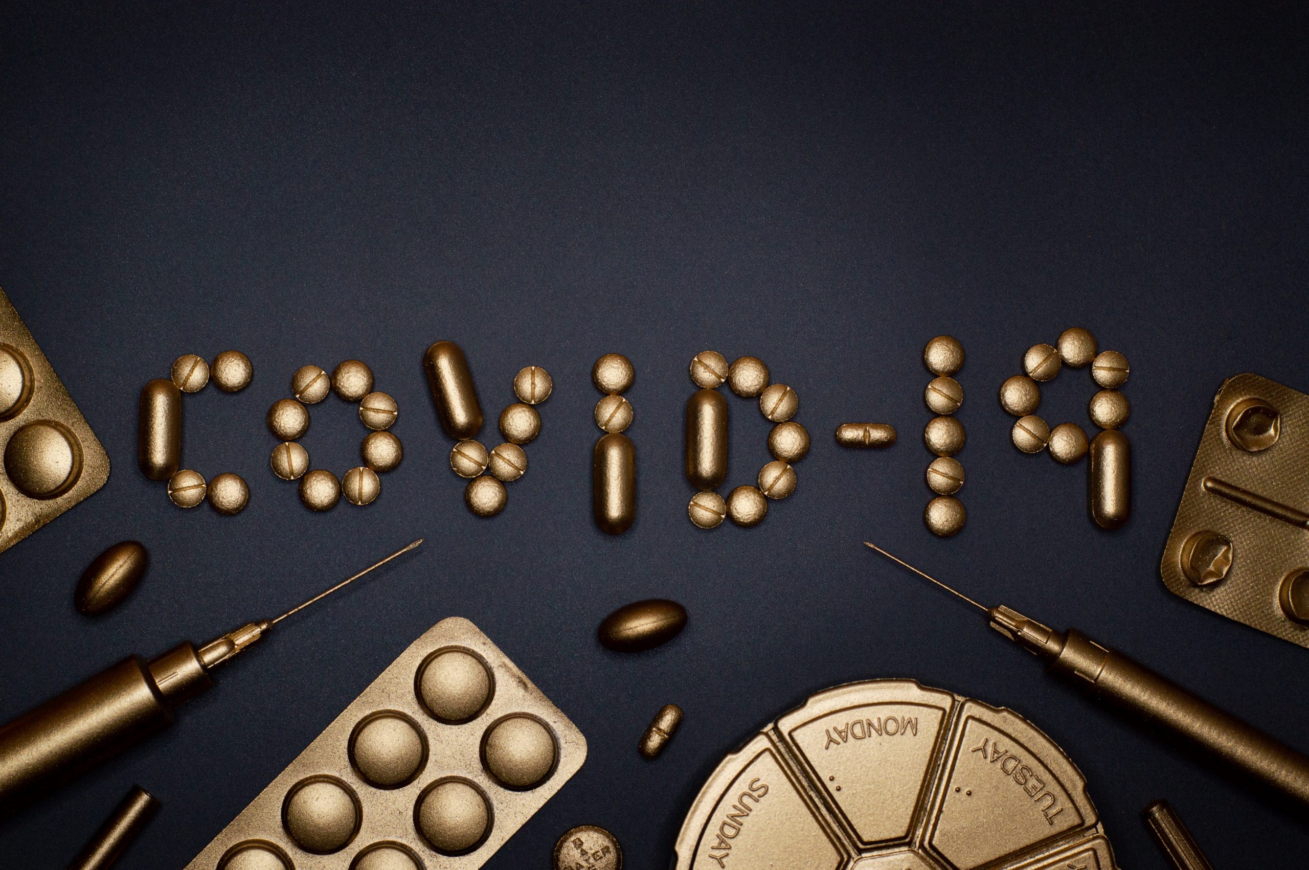 syringe and pills coronavirus